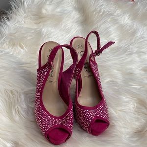 Pink high heel shoe